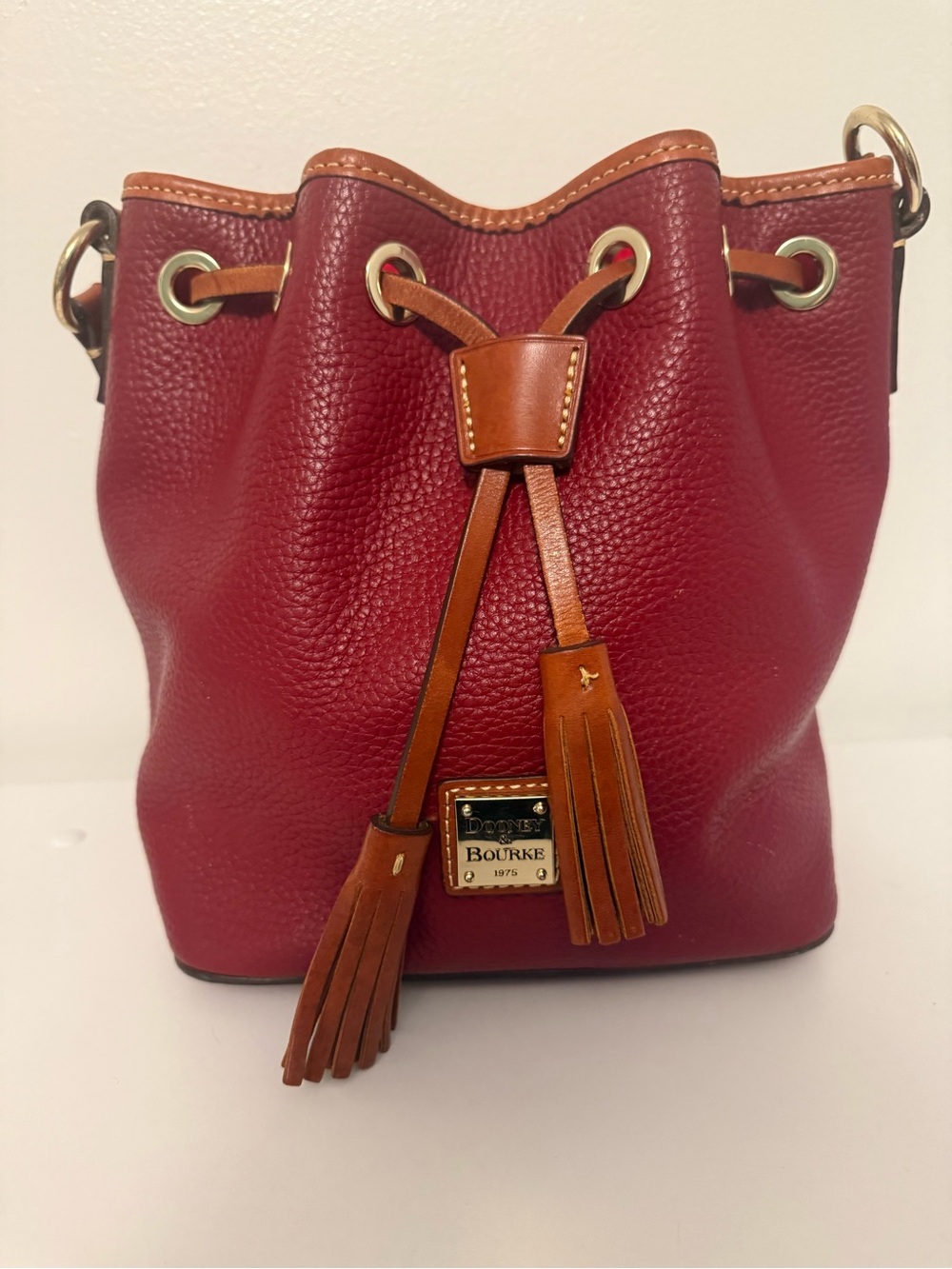 Dooney & Bourke Red Pebble Leather Drawstring Crossbody with Tan Trim
